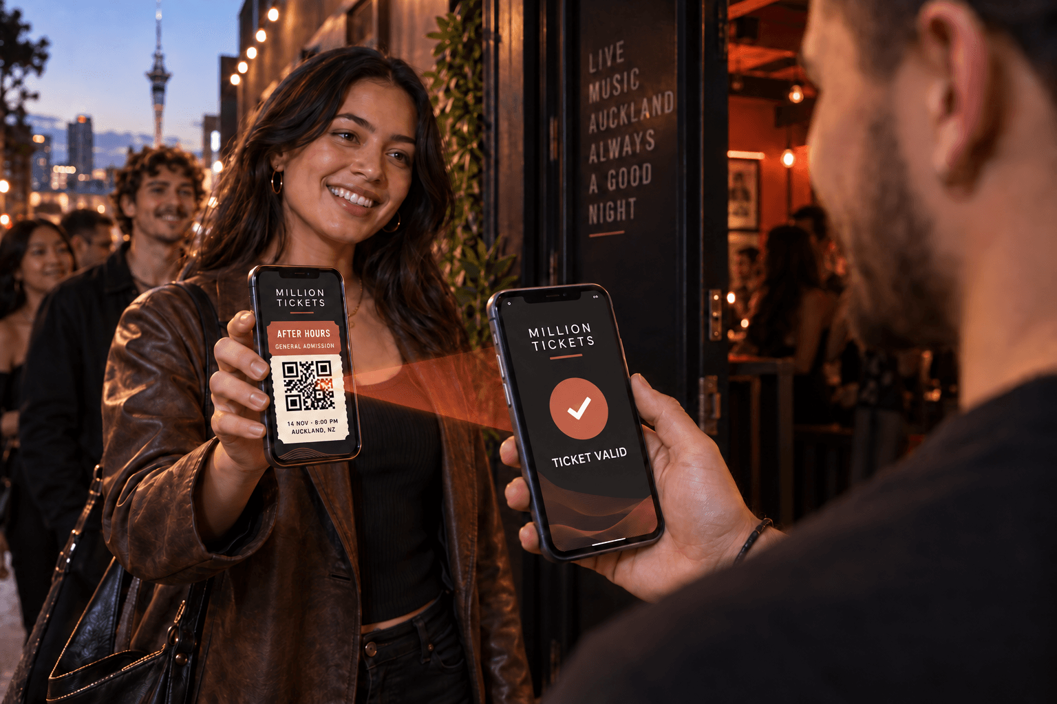 Door staff scanning an attendee's QR ticket with the Million Tickets scanner